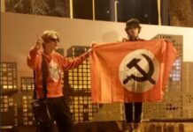 Возле ТЦ «Афины» в Одессе подростки достали флаг с серпом и молотом для видео